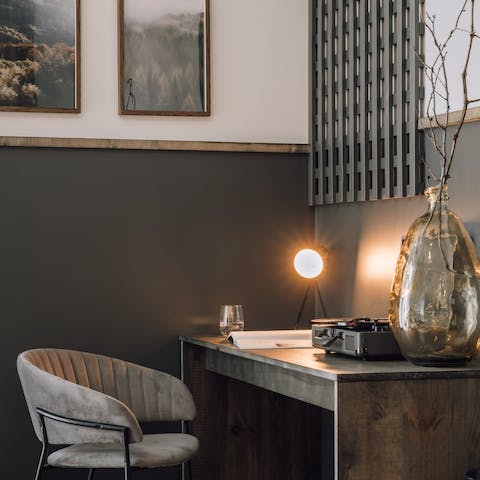 Catch up on work emails at the desk in the living area