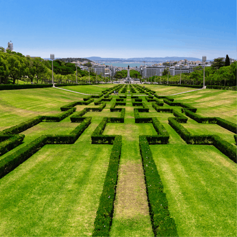 Enjoy a morning stroll through Parque Eduardo VII, a short walk away