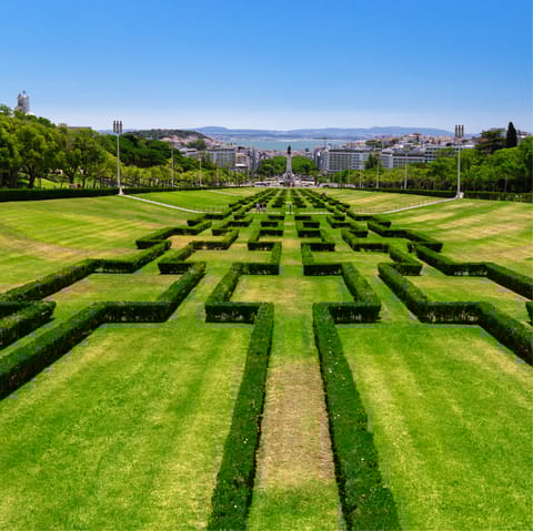 Enjoy a morning stroll through Parque Eduardo VII, a short walk away