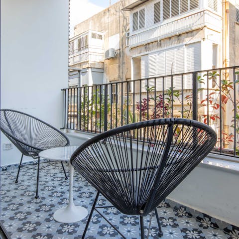 Sit out on the balcony's pretty tiles and doze off to the sounds of the street below