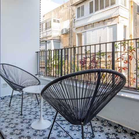 Sit out on the balcony's pretty tiles and doze off to the sounds of the street below