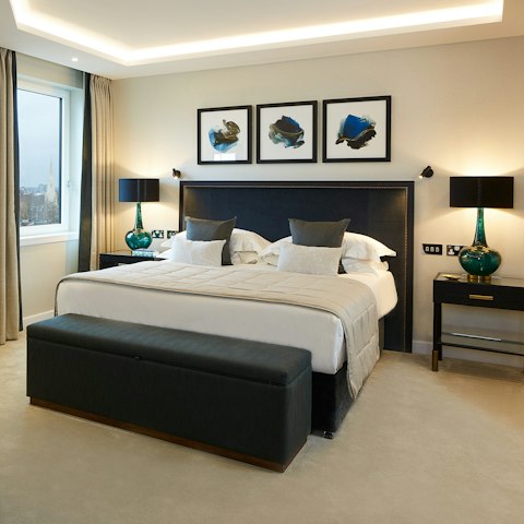 Slip into a deep slumber in the serene bedroom