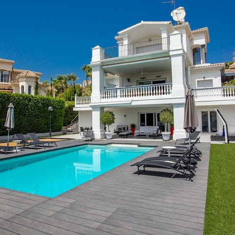 Spend blissful hours lounging by the pool, catching up on your holiday read, and occasionally taking a dip