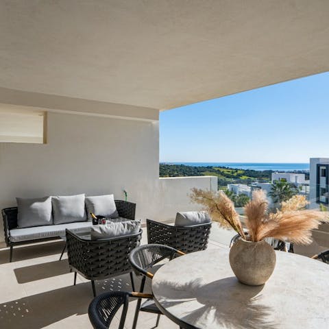 Hang out on the balcony with a glass of something chilled