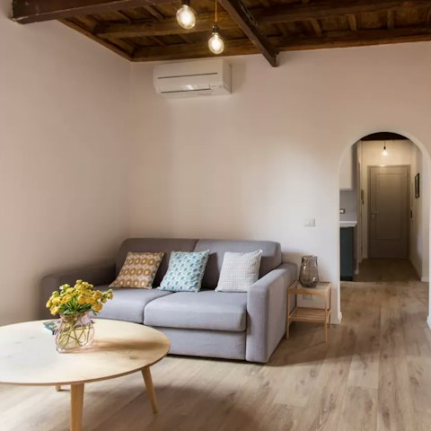 Relax in the living room with a glass of Italian wine
