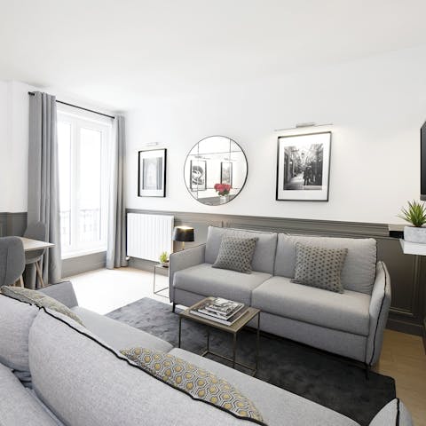 Kick back in the bright living room with a glass of French wine after a day of Paris sightseeing