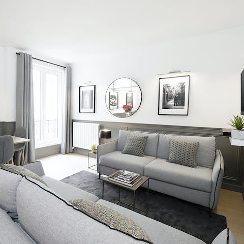 Kick back in the bright living room with a glass of French wine after a day of Paris sightseeing