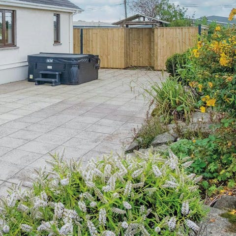 Take a dip in the hot tub and unwind in peace