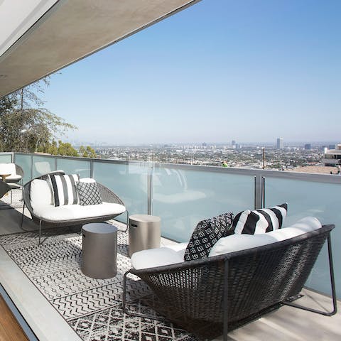 Take in spectacular panormaic views across LA from the tranquil balcony terrace