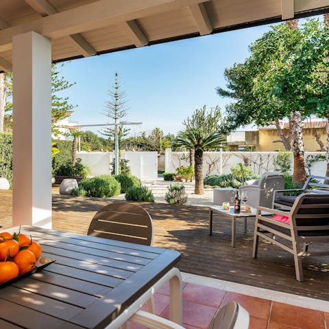 Enjoy delicious alfresco meals and Sicilian wine on the private terrace
