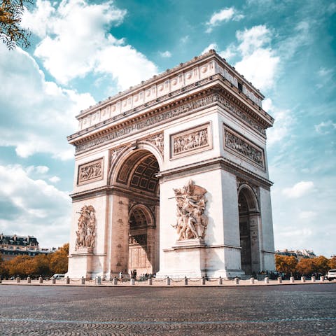 Stroll over to the Arc de Triomphe before shopping along the Champs-Élysées