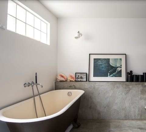 Take a rejuvenating soak in the freestanding tub