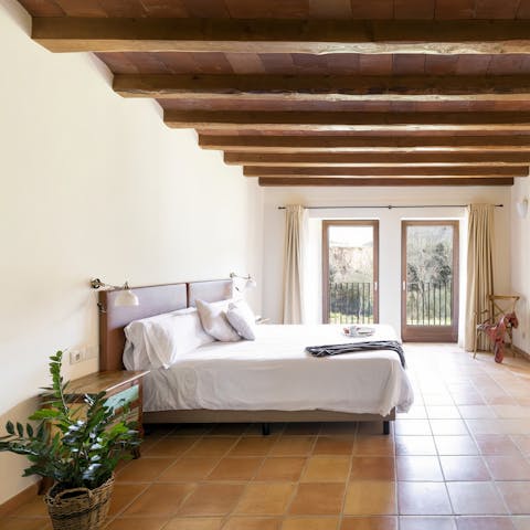 Wake up to woodland scenes through the bedroom windows