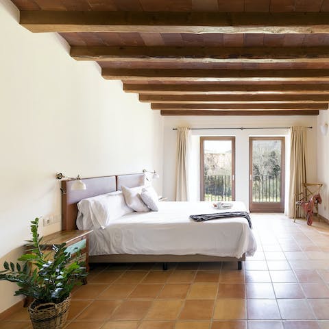 Wake up to woodland scenes through the bedroom windows