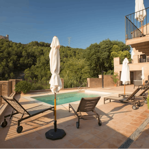 Make lounging beside the shared pool your only firm plan for the day