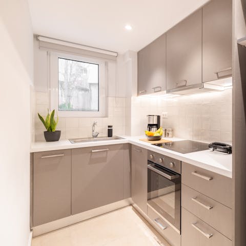 Rustle up light bites or relaxed dinners in your sleek kitchen