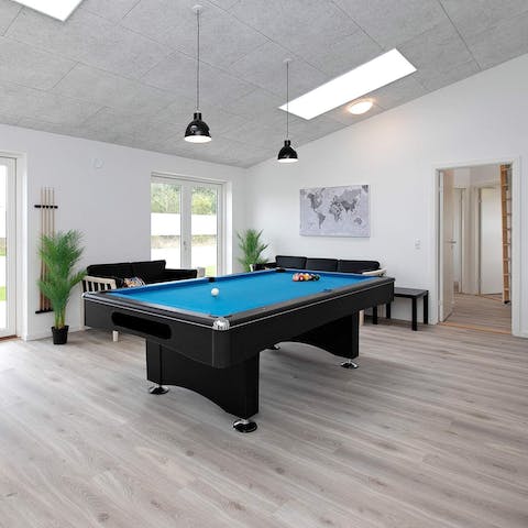 Challenge each other to friendly game of pool