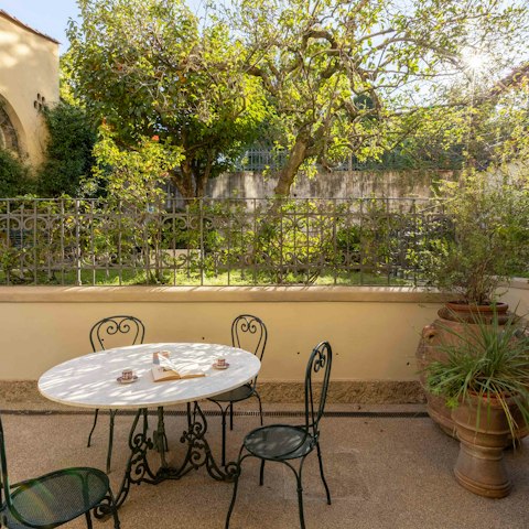 Relax in the Italian sun on the private terrace surrounded by gardens filled with citrus trees