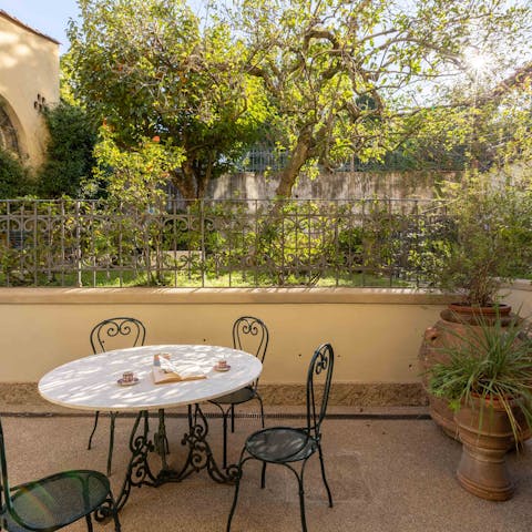 Relax in the Italian sun on the private terrace surrounded by gardens filled with citrus trees