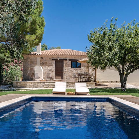 Swim gentle laps in your large private pool