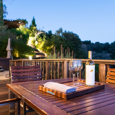 Watch the sun set over the majestic countryside and raise a glass of California's finest wine