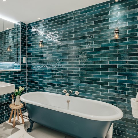 Look forward to soaking your cares away in the freestanding tub