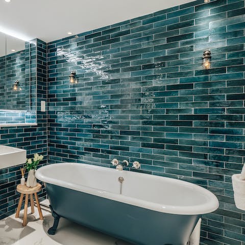 Look forward to soaking your cares away in the freestanding tub