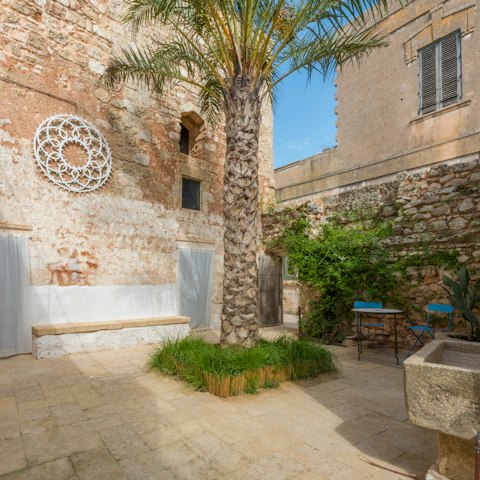 Enjoy your morning coffee on the sun-drenched courtyard