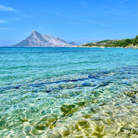 Spend your days on the beach of Mare e Rocce, just 120 metres away