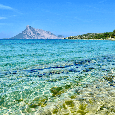 Spend your days on the beach of Mare e Rocce, just 120 metres away