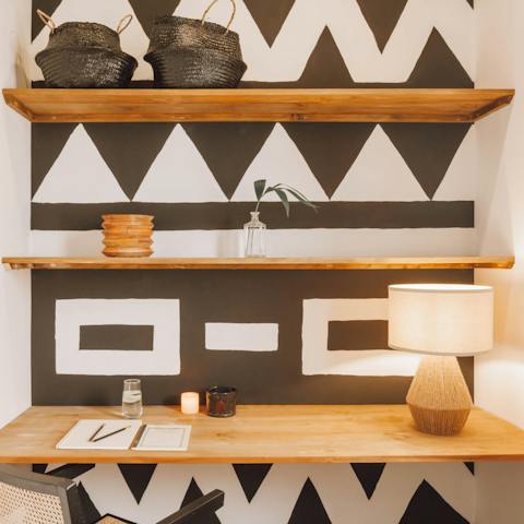 Catch up on some work in the small but stylish home office