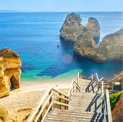 Explore the beaches and coves nestled along the Algarve coastline