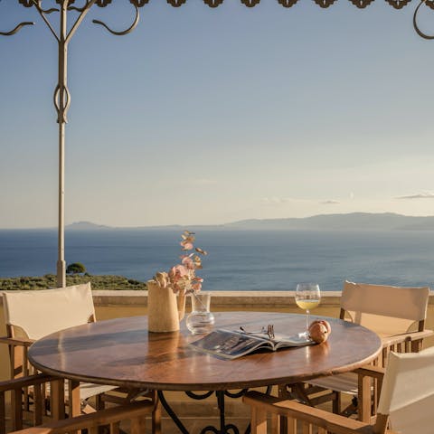 Grab a glass of wine and head to the terrace at the golden hour