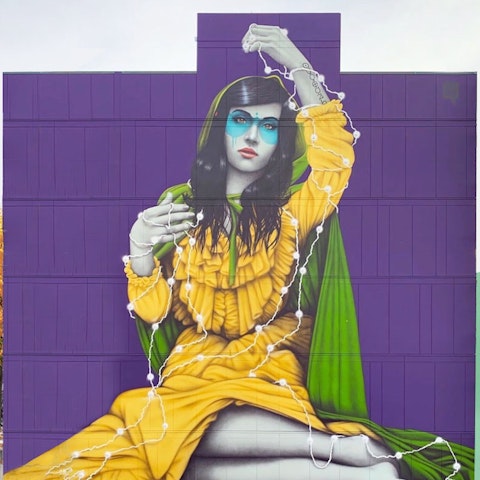 Admire the unique mural painted by artist Fin Dac