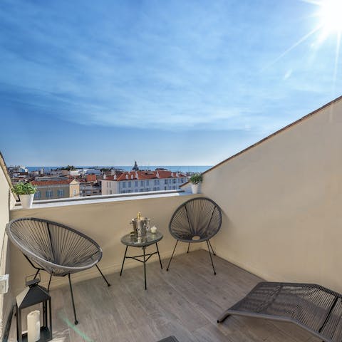 Take in sea views from the sunkissed balcony