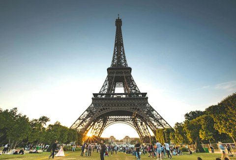 Marvel at the Eiffel Tower's iconic iron silhouette, a thirty-five-minute walk away