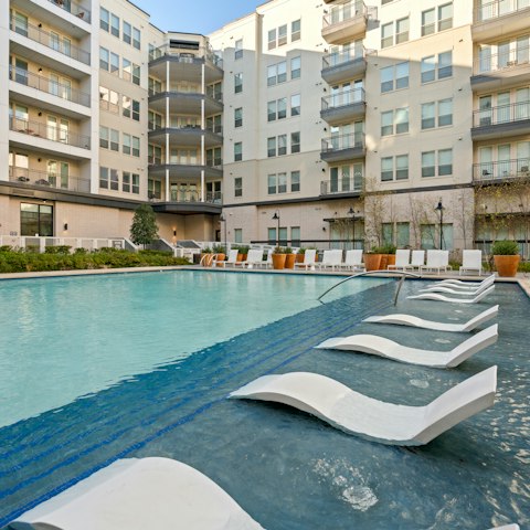 Chill out by the outdoor swimming pool