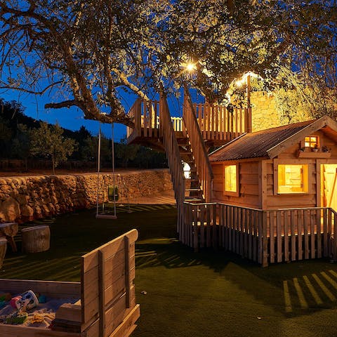 Let the kids run wild in their own tree house and play zone