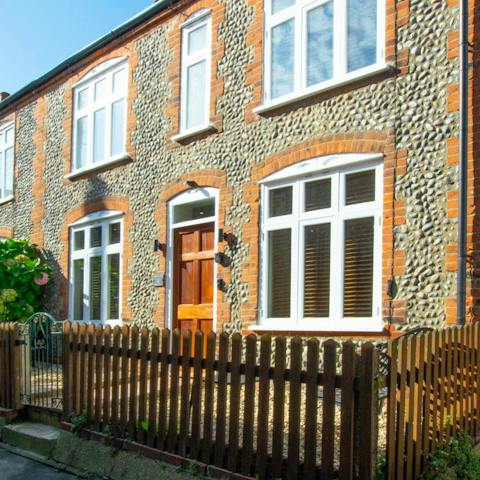 Soak up the charm of this double-fronted flintstone cottage