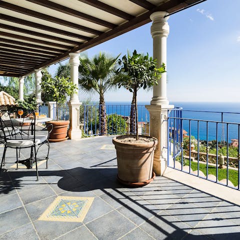 Gaze out at the Mediterranean Sea from one of the balconies