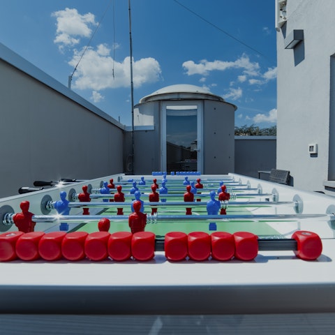 Play a game of outdoor foosball