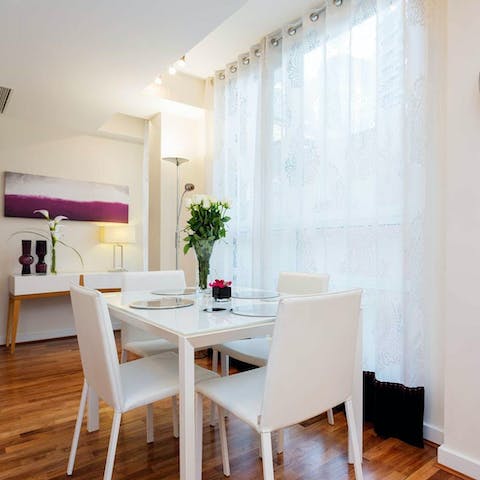 Tuck into a home-cooked meal around the dining table