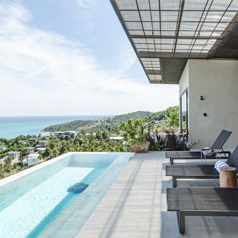 Take in the breathtaking sea views from your infinity pool