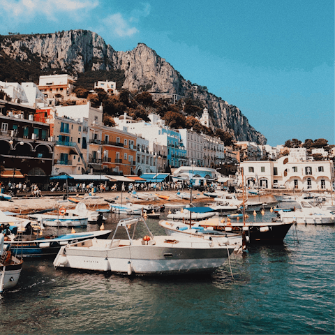 Take a boat trip around the coast of Capri – the harbour is a fourteen-minute drive