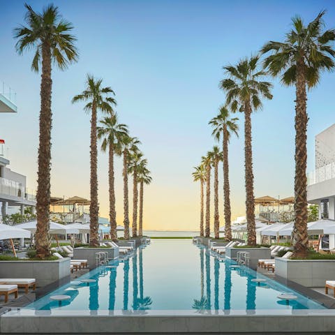Mingle with your fellow guests on the communal pool deck