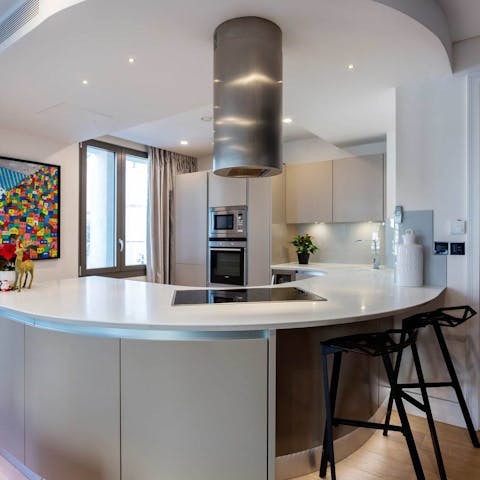 Start your morning with a fresh coffee at the sleek breakfast bar