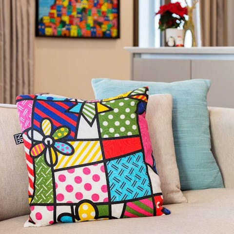 Admire the bright and cheerful decor throughout the flat