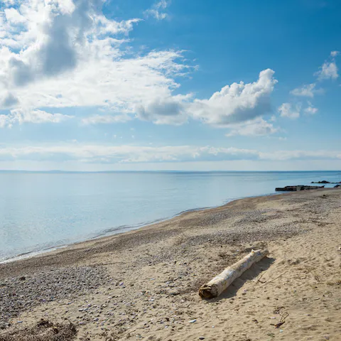Spend afternoons at Metamorfosi Beach, just across the street