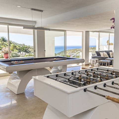 Grab a cue for a game of snooker in the bar and games room