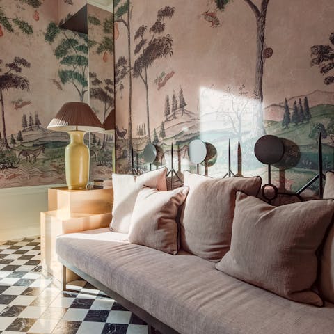 Unwind on the cushy sofa – throw open the French doors and you'll even have a view